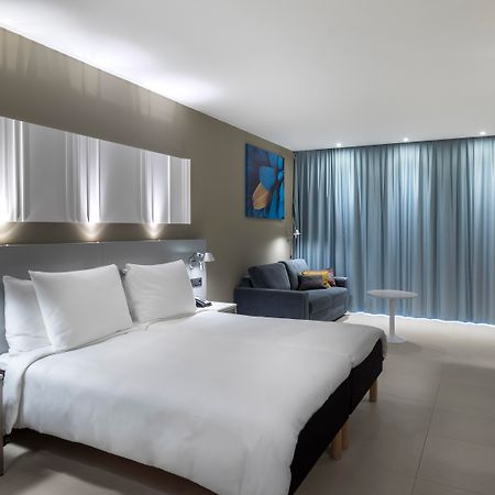 פוארטו דה מוגן Radisson Blu Resort & Spa, Gran Canaria Mogan מראה חיצוני תמונה A room at the hotel